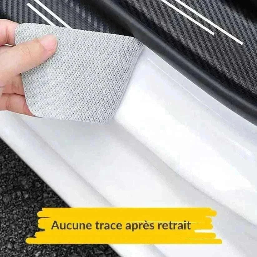 Retrait adhesif seuil porte Chevrolet sans traces